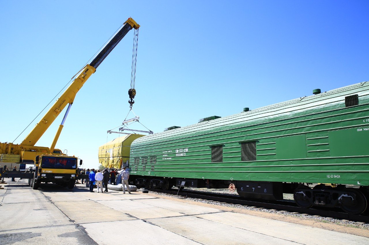 GX3 being loaded onto a railway carriage for transportation to the hanger for encapsulation and mating with the launch rocket
