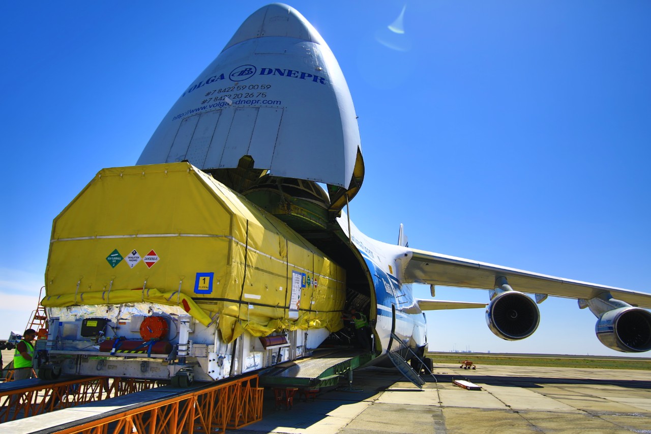 Unloading underway of GX3 from the Antonov An-124 heavy transporter at Baikonur Cosmodrome