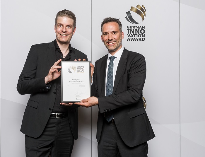 Deutsche Telekom’s David Fox and Inmarsat’s Stefan Magiera collect the prestigious German Innovation Award for the European Aviation Network (EAN).