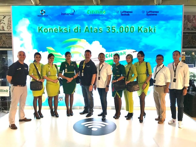 Inmarsat and Mahata executives, with Citilink cabin crew, celebrate the go-live of GX Aviation inflight broadband on the Indonesian low-cost carrier’s first aircraft.