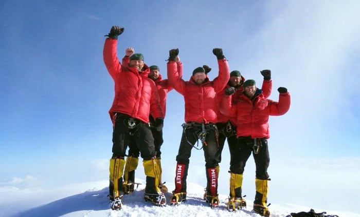 65 Degrees North Team celebrating on the Mount Denali summit