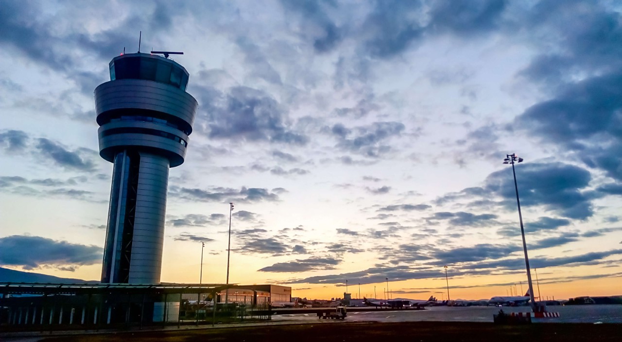 Sofia Airport traffic control tower against a beautiful sunset
