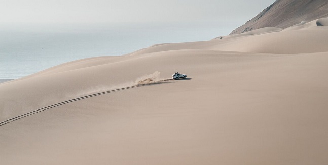 Land Rover crossing desert