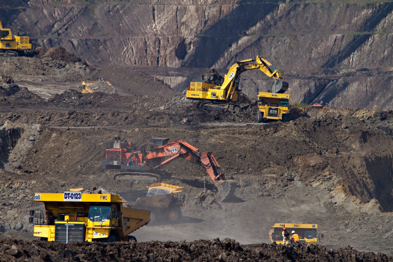 Diggers at an opencast mine