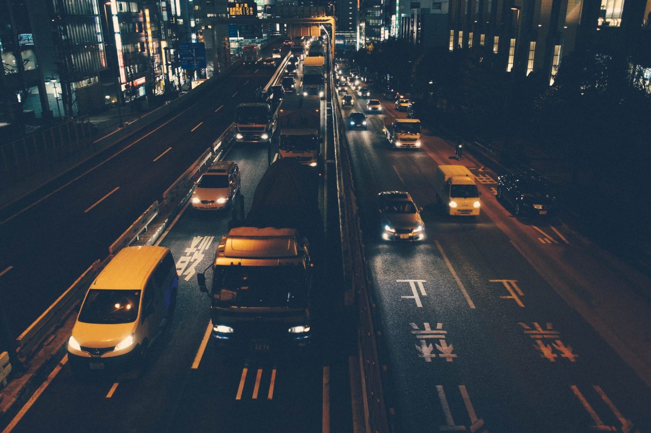 Traffic at night in city centre queueing 