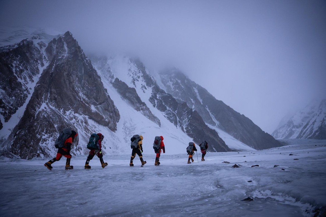 Nims and team trekking up K2