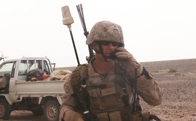 Soldier using tactical radio