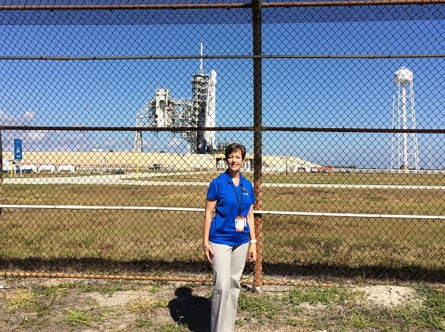 Rebecca Cowen-Hirsch with the Falcon 9 rocket carrying GX4 in the background on the launchpad
