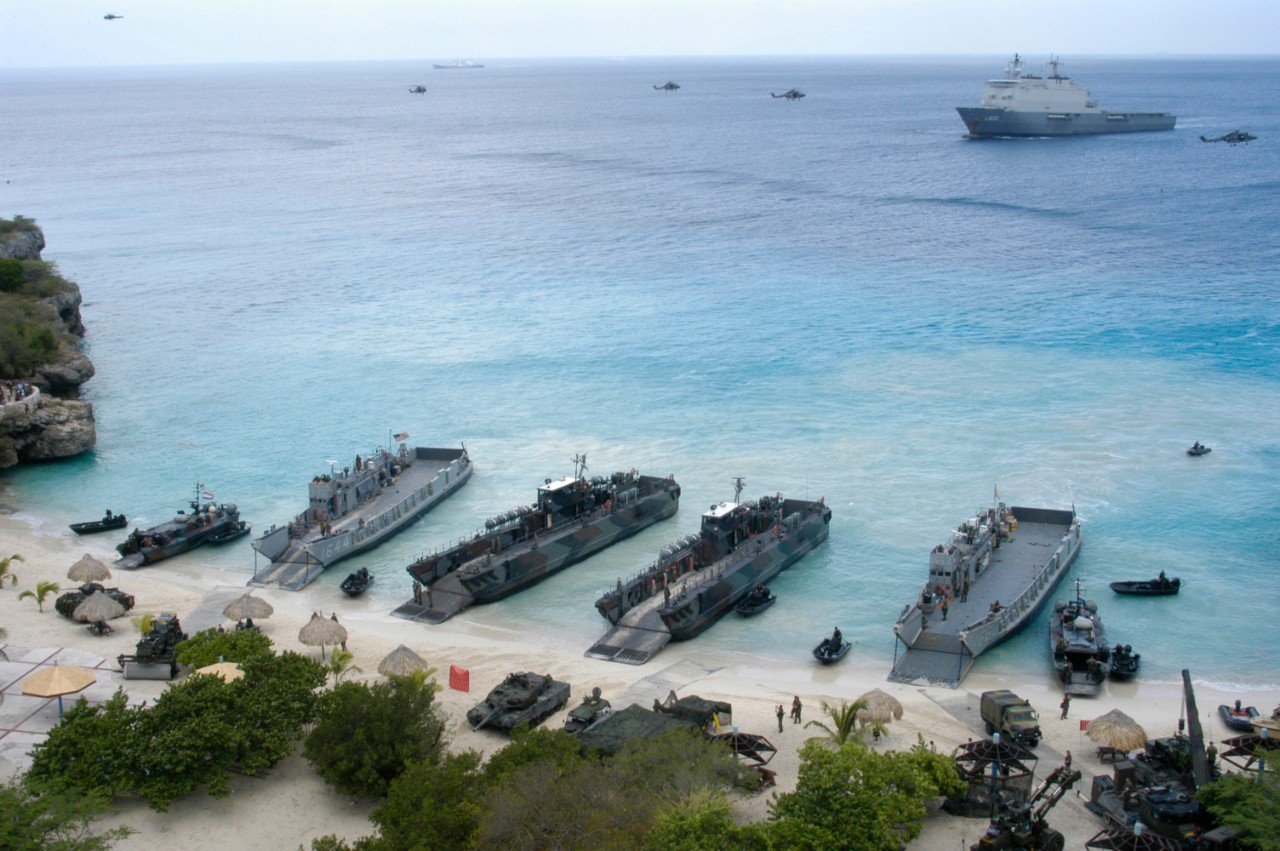 Curacao, Netherlands Antilles (June 6, 2006) - Two Landing Craft Utilities (LCU) assigned to Amphibious Craft Unit Two (ACU-2), rehearse storming the beach in Curacao, Netherlands Antilles. ACU-2 is embarked aboard the amphibious assault ship USS Bataan (LHD 5), underway joining military forces from France, Spain, United Kindom and Venezuela in the Dutch led Joint-Caribe Lion 2006 (J-CL06) exercise. U.S. Navy photo by PhotgrapherÕs Mate 3rd Class Jeremy L. Grisham (RELEASED)