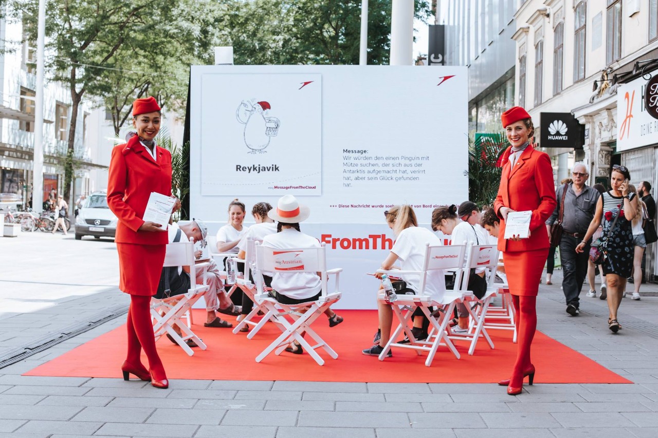 Austrian Airlines cabin crew with artists