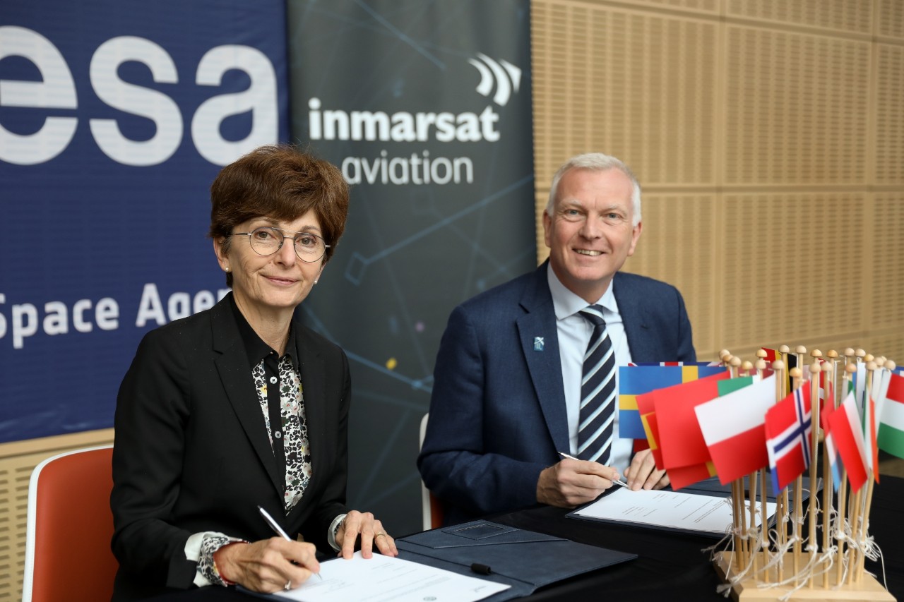 Phil Balaam and Magali Vaissiere at the signing ceremony