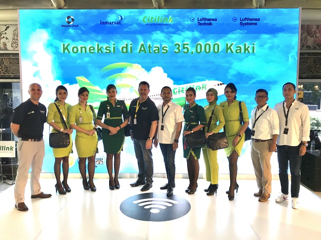 Inmarsat and Mahata executives, with Citilink cabin crew, celebrate the go-live of GX Aviation inflight broadband on the Indonesian low-cost carrier’s first aircraft.