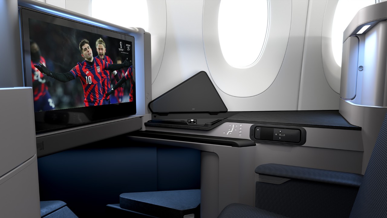 Inflight entertainment screen on aircraft displaying a football match