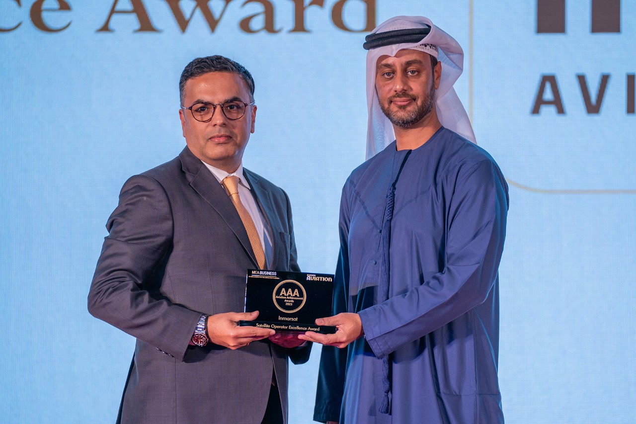 Photo showing the handing over of the award to Inmarsat