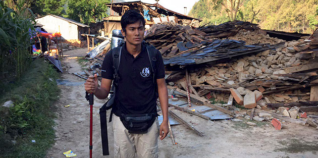 TSF hiking through a devastated Nepalese village