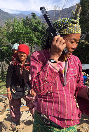 IsatPhone Pro in use by Nepalese residents to enable communications