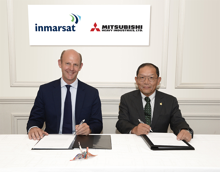 Contract signing between Rupert Pearce, CEO, Inmarsat and Masahiro Atsumi, Vice President & Senior General Manager, Space Systems, Mitsubishi Heavy Industries, Ltd.