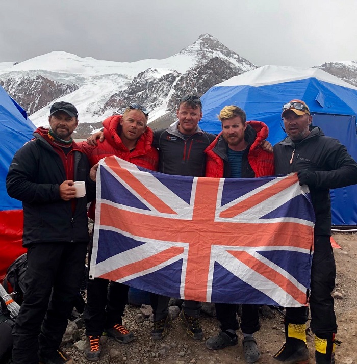 During the climb the 65 Degrees North Team had been carrying the flag of a fellow mountaineer Simon Brooke, who successfully summited the ‘Roof of Americas’ in 1999, but whose life had been tragically cut short due to a road accident in 2003.