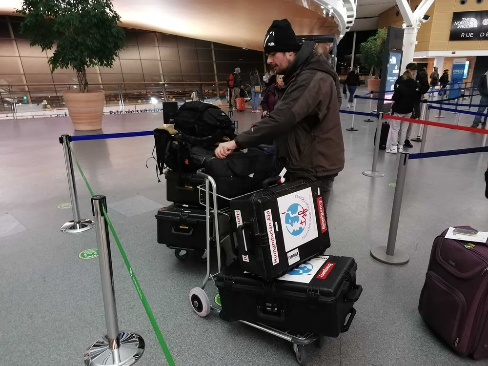 Man at airport with luggage 