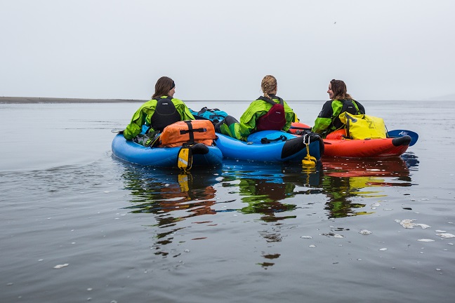 Laura Bingham, Pip Stewart and Ness Knight in canoes