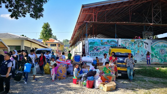 Residents being evacuated due to the imminent eruption of Mount Mayan