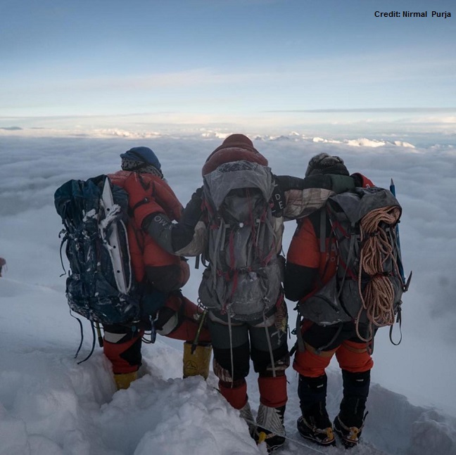 Nims and team on the summit of  Mt Shishapangma