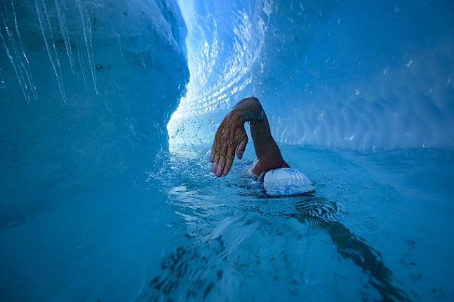 Lewis Pugh is the first person to swim in a river under an Antarctic ice sheet