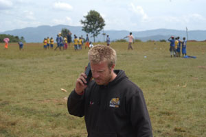 Bhubesi Pride team member using Inmarsat's IsatPhone Pro