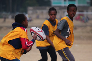 Children playing rugby