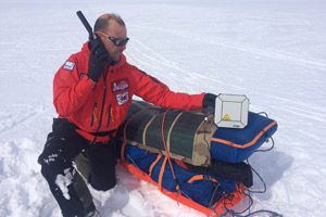 65 Degrees North Team using Inmarsat communications equipment from Greenland