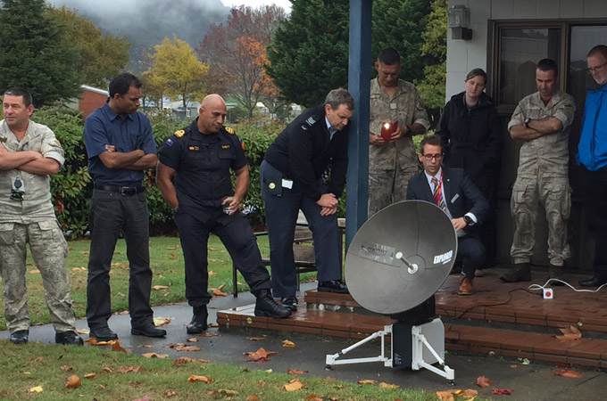 Members of New Zealand's military and civil government agencies enjoying a Global Xpress demonstration 