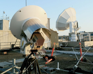 two very large terminals outside a facility assembled on scaffold plinths