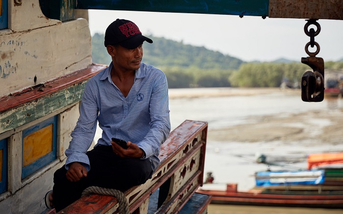 Thai fisherman on his vessel