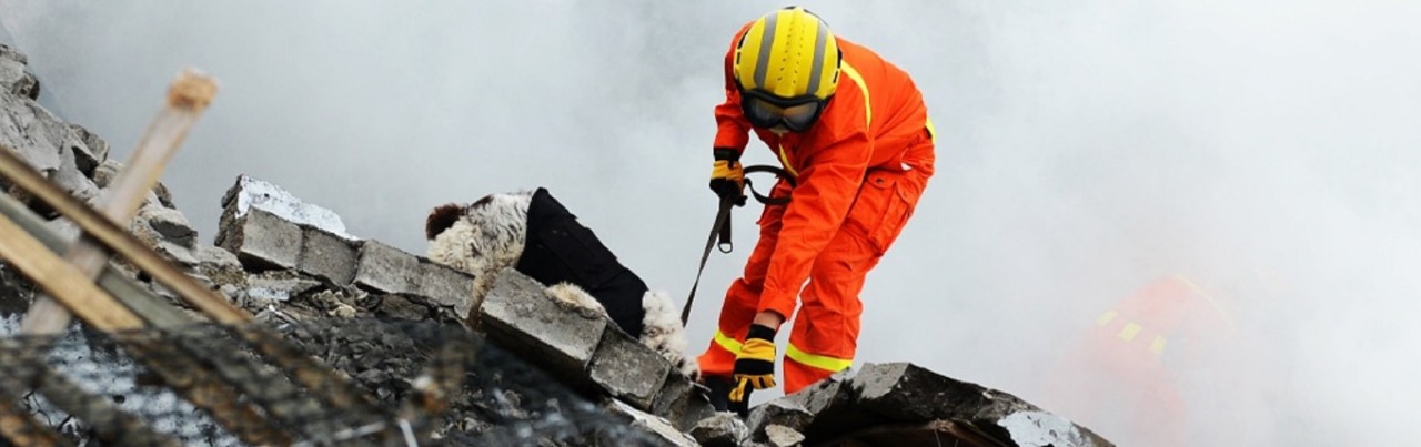 Rescuer working in collapsed buildings following a disaster