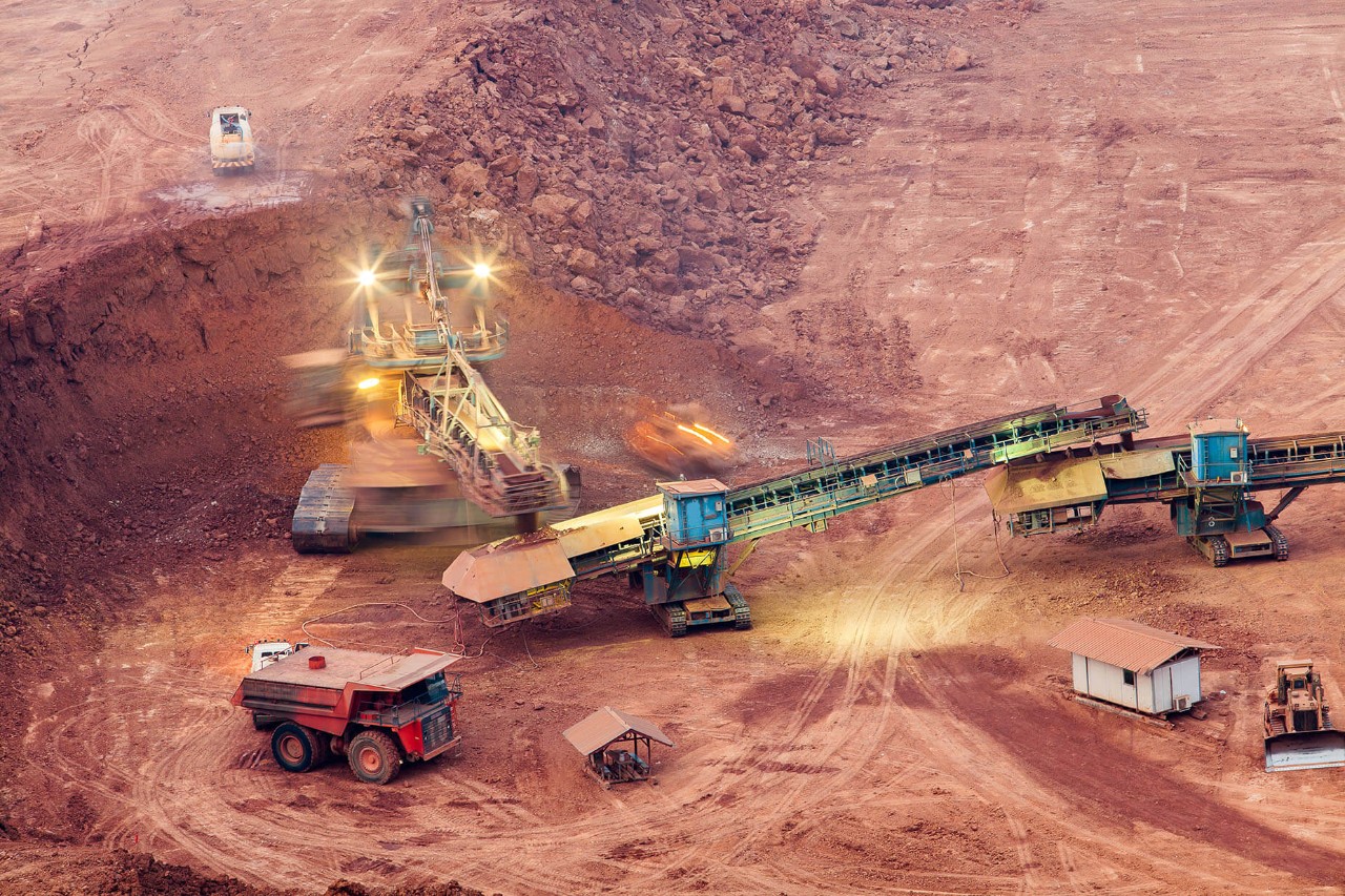 Raw materials being extracted in an open cast mine