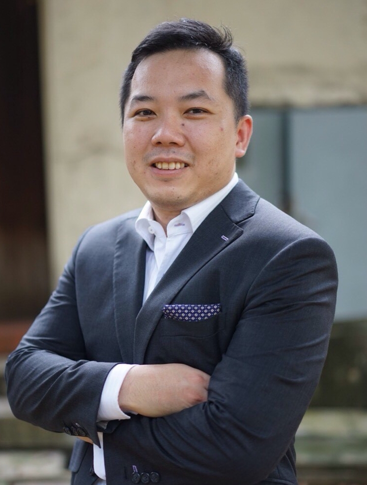 Inmarsat's Keng Hoe Toh head and shoulders wearing a suit and shirt
